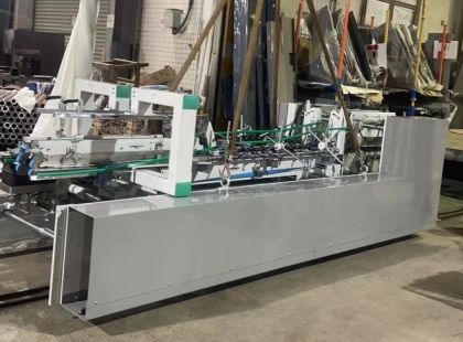 Loading of DGM folder-gluer